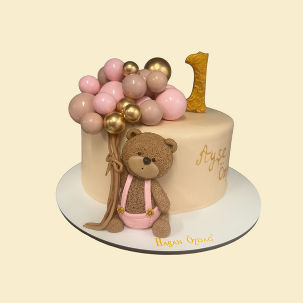 Runde Torte mit Bär Motiv und Kuheln in Rosa beige und Gold