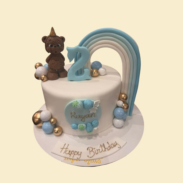 Teddy Bär mit Regenbogen