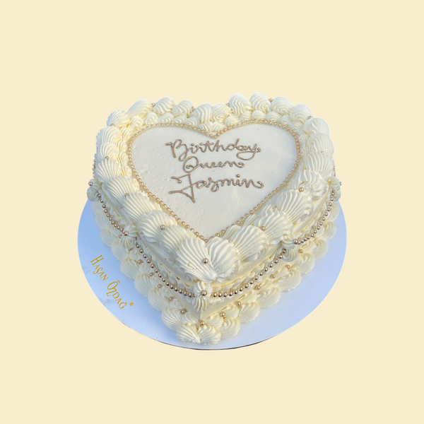Herzform Torte mit Goldperlen