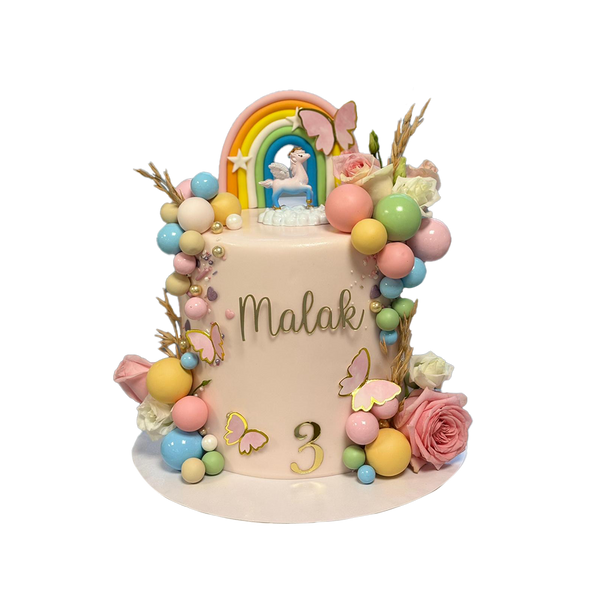 Beige Torte mit bunte Kugeln, Regenbogen, Schmetterlingen, Pegasus und Blumen