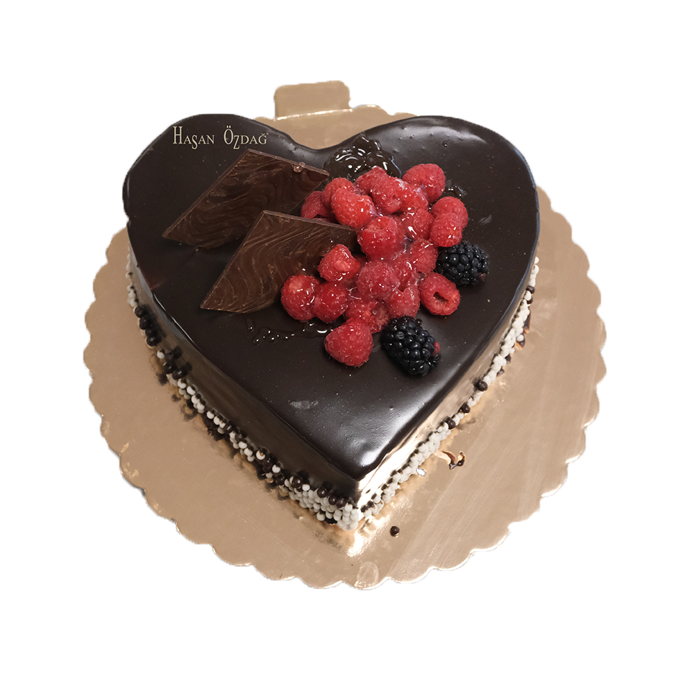 Herzförmiger Schoko-Drip-Cake mit Beeren und Schokostücken Herzförmiger Schoko-Drip-Cake mit Beeren und Schokostücken