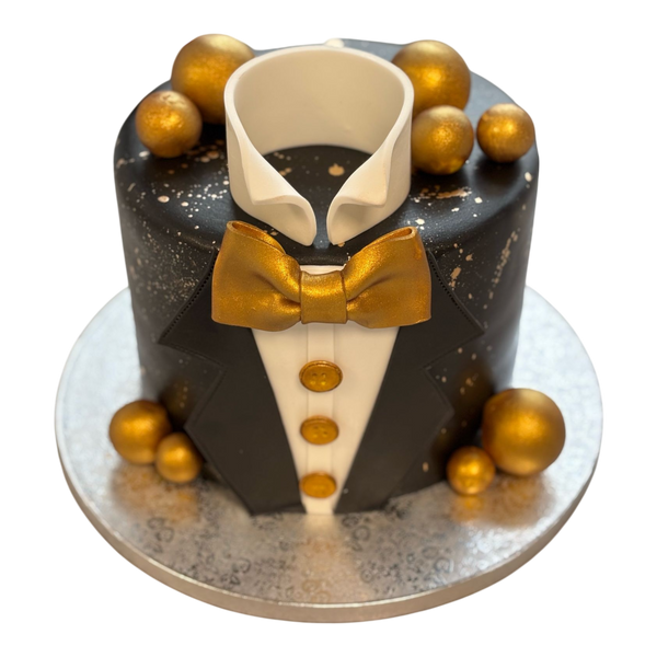Schwarze Torte mit fliege in gold gild kugeln Kragen Hemd