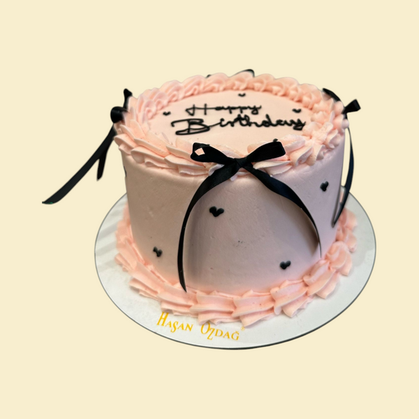Rosa Vintage Birthday Cake mit schwarzen Schleifen