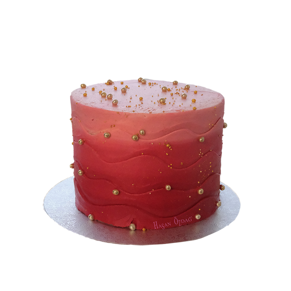 Rosa Ombre-Torte mit Wellenstruktur und Goldperlen
