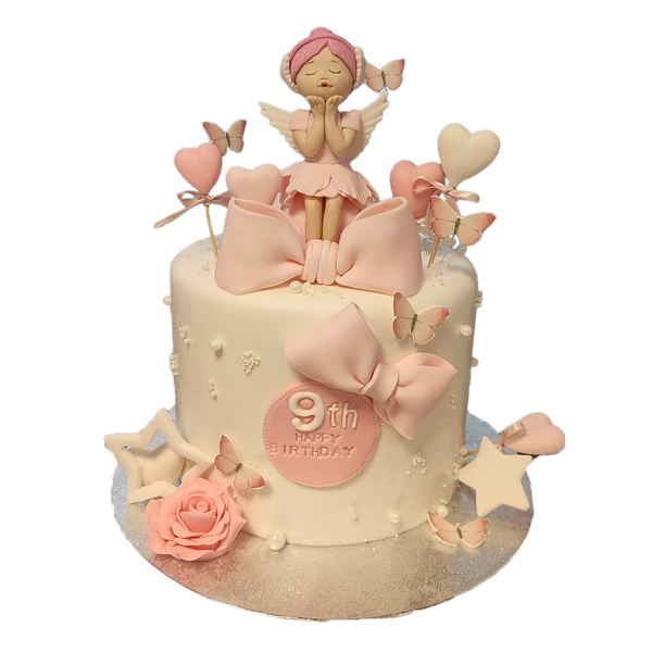 Torte mit Perlen, Schmetterlingen, Schleifen, Sternen, Blumen und Engel