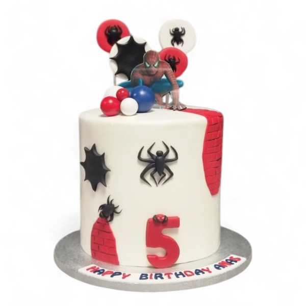 weiße Spiderman torte mit Spinne, Kugeln und Superheld