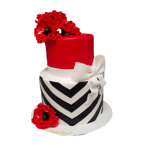Zweistöckige Torte mit Muster, rot und Mohnblumen. An der Seite ist eine Schleife