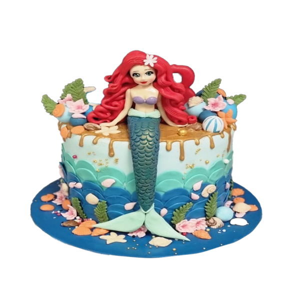 Arielle-Torte  in Blau-Tönen mit Caramell-Drip, Muscheln und Arielle