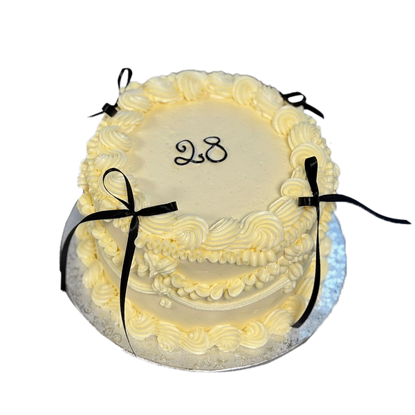 Coquette-Torte deluxe mit schwarzen Schleifen