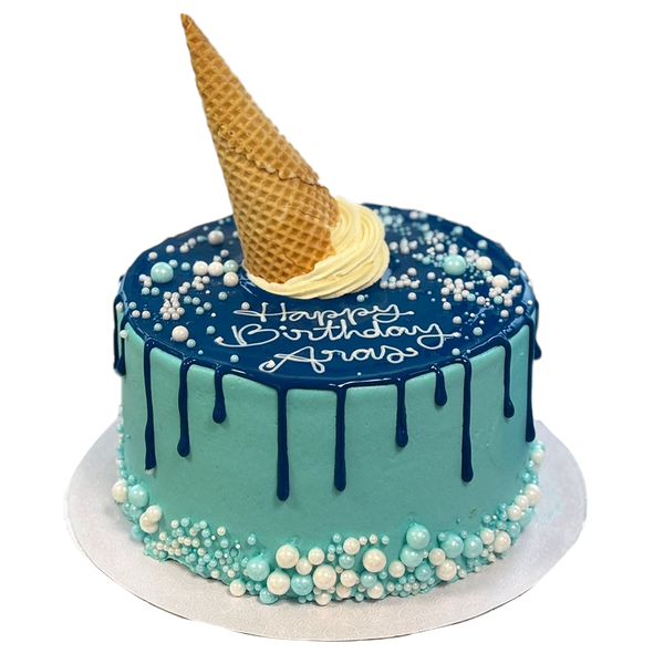 Blauer Drip-Cake mit Eiscreme und Perlen