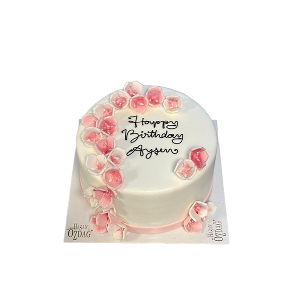 Weiße Torte mit rosa Kirschblüten