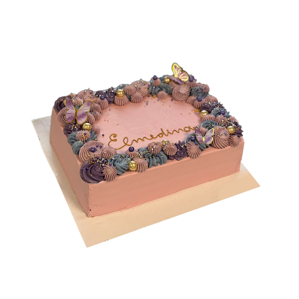 Eckige Torte mit Spritzdeko, goldenen Perlen und Schmetterlingen