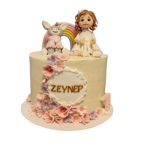 Beige Torte mit Regenbogen, Blüten, Esel und Mädchen