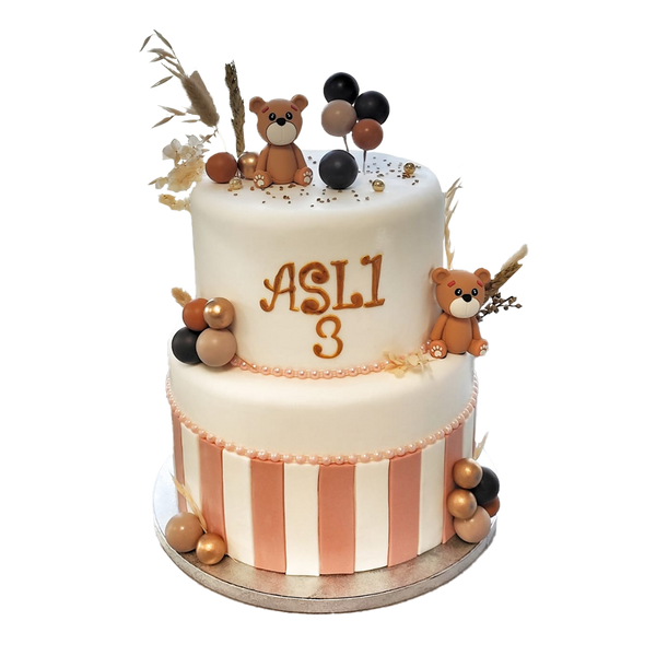 Zweistöckige, weiße Torte mit  braunen Streifen, Kugeln, Getreide-Deko, Perlenkette und Teddys