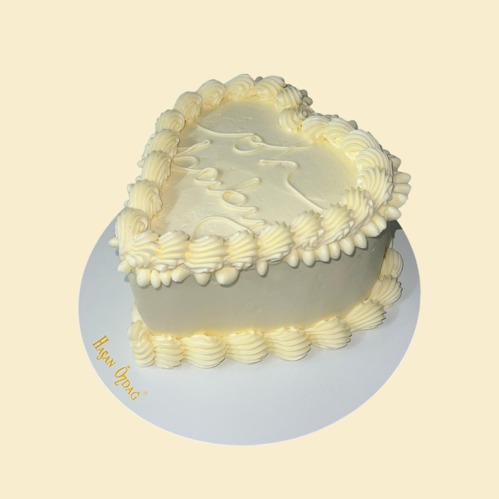 Herzform Torte mit Oh Baby Schrift 
