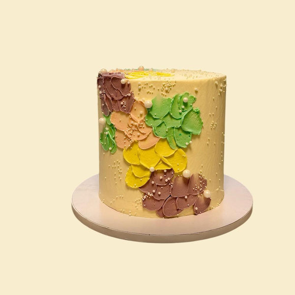 Buttercreme Blumentorte in Pastellfarben