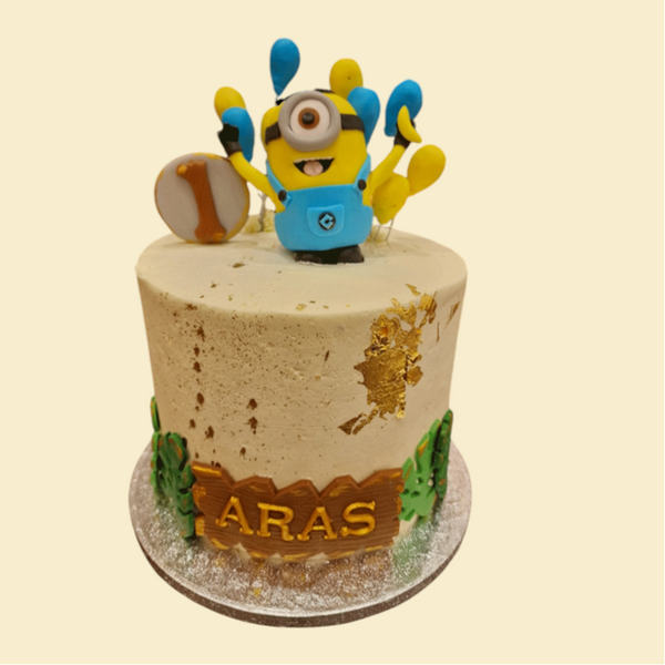 Miniontorte mit modellierter Figur und Ballons