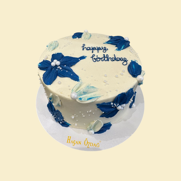 Elegante Blütentorte in Blau & Creme