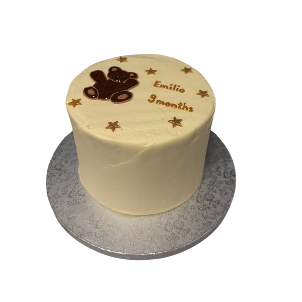 Torte mit gemaltem bär und sternen