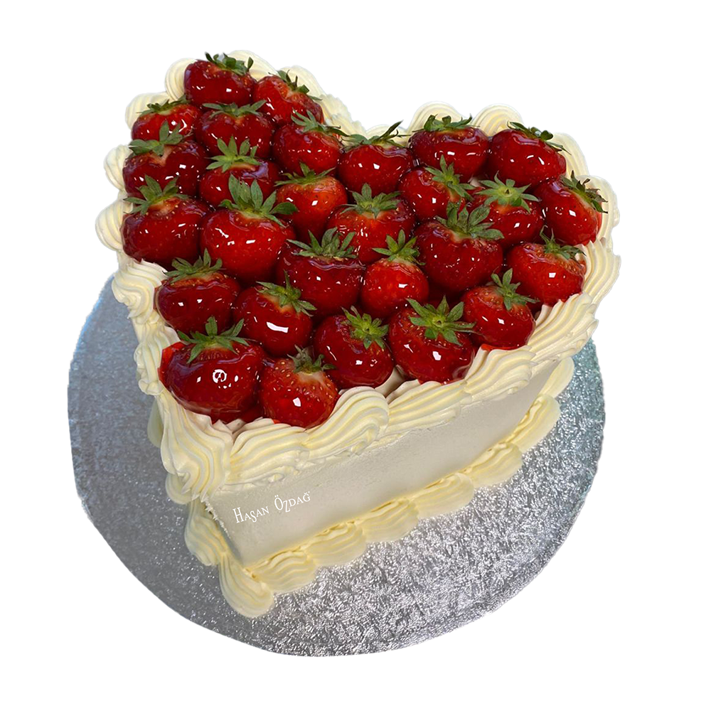Herzförmige, weiße Coquette-Torte mit Erdbeeren