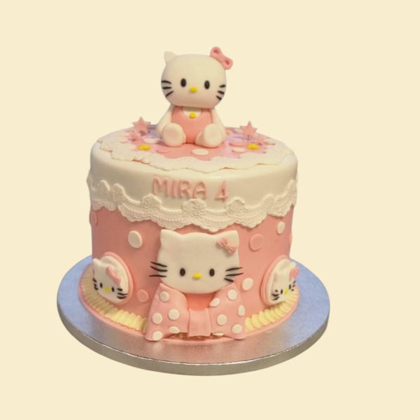 Rosa Hello Kitty Geburtstagstorte mit Figur, Spitzenrand und personalisiertem Namen