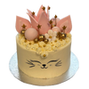 Weiße Katzentorte mit Blume, Katzengesicht, rosa Krone, goldenen Sternen und Kugeln.