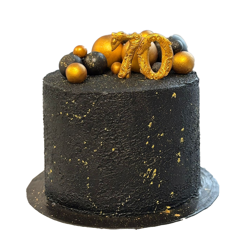 Schwarze Torte mit Struktur, Goldspritzern und Kugeln