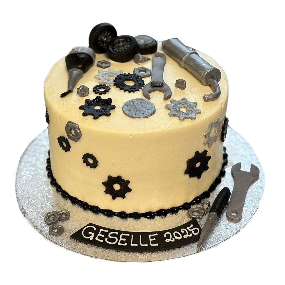 Torte mit Schrauben, Rädern und Motorteilen