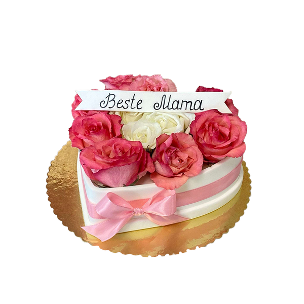 weiße Herztorte mit rosa Schleife, Banner und weißen und rosa Rosen