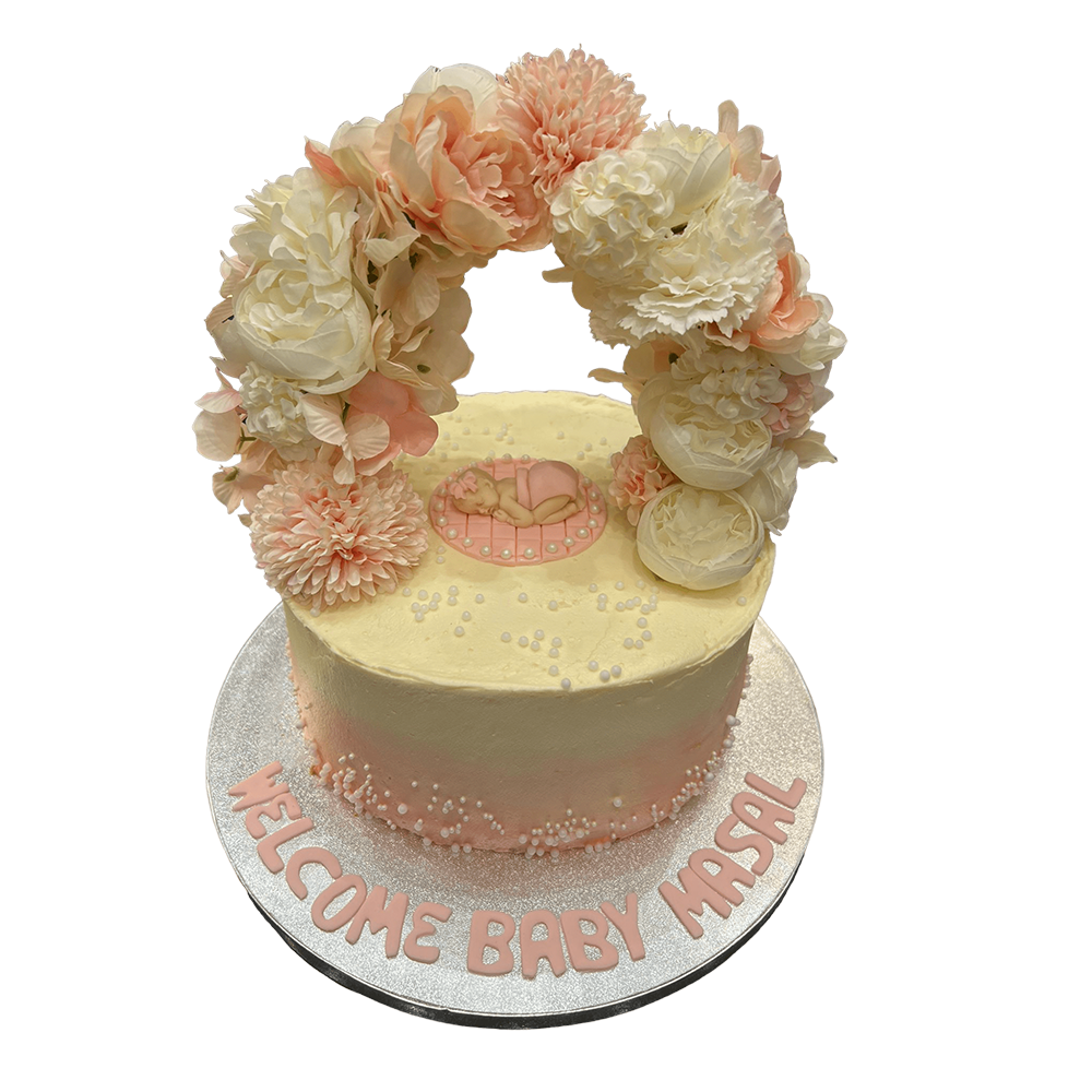 Weiß-rosa  Ombre.Torte mit Blumenkranz und schlafenden Baby 