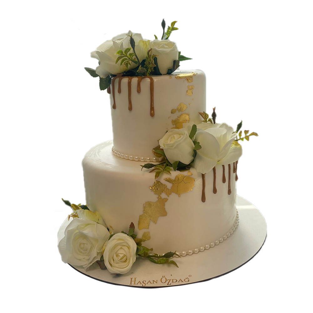 Drip Cake mit Blattgold und Rosen