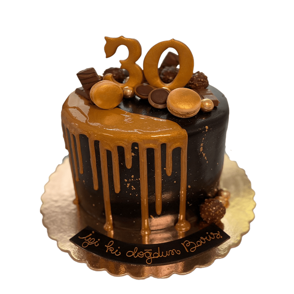 Drip-Cake mit Caramel-Drip, Tofifee, Bueno, Rocher und Macarons