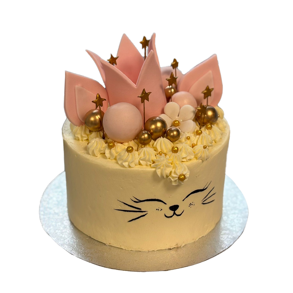 Weiße Katzentorte mit Blume, Katzengesicht, rosa Krone, goldenen Sternen und Kugeln.