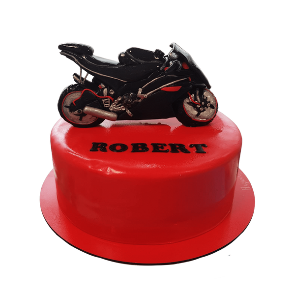 Einstöckige Torte mit roten Fondant und Motorrad
