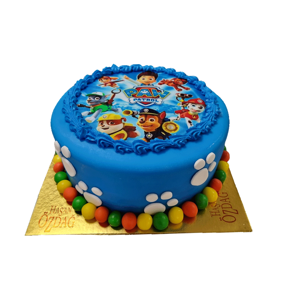 Blaue Kindertorte Pfoten-Patrouille  mit Perlen, weißen Pfoten und Spritzdeko.