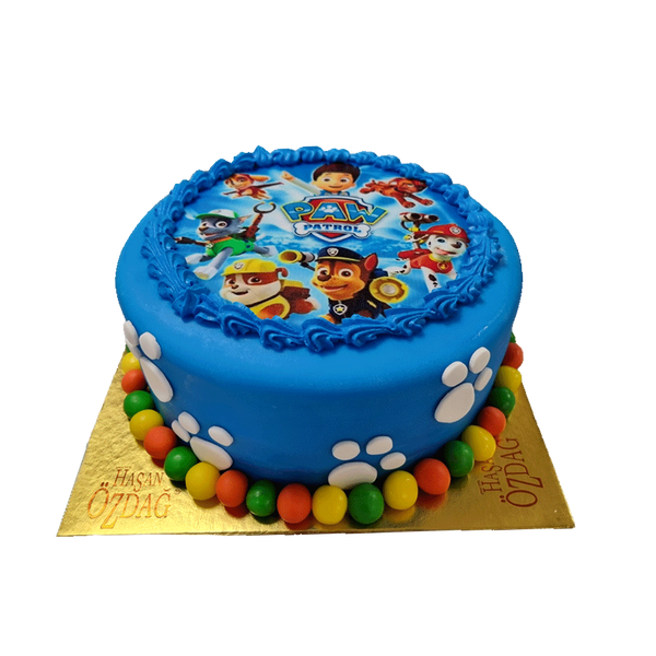 Blaue Kindertorte Pfoten-Patrouille  mit Perlen, weißen Pfoten und Spritzdeko.