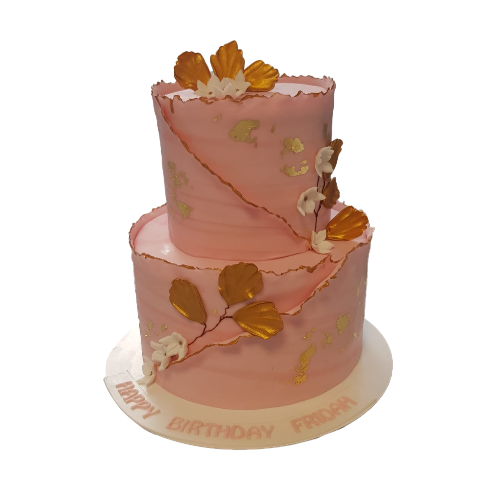 Rosa Torte mit Blattgold und goldenen Blättern