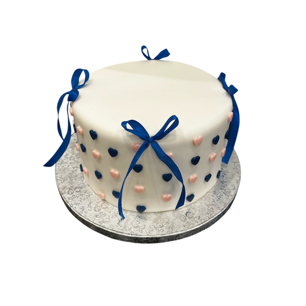 runde Fondant it ´ s a boy Torte mit blauen Schleifen und Rosa und blauen Herzen
