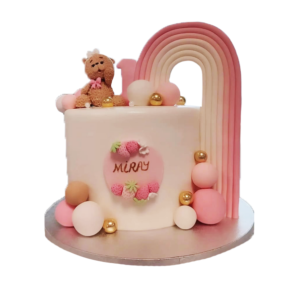 Rosa Torte, mit rosa-weißen  Kugeln, rosa Regenbogen, Erdbeeren, goldKugeln und Teddy-Figur