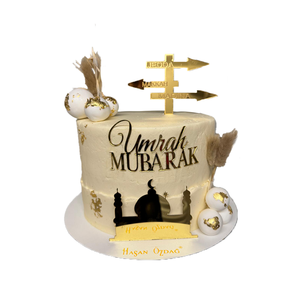 Beige Umrah Mubarak Torte mit Kugeln und Golddeko
