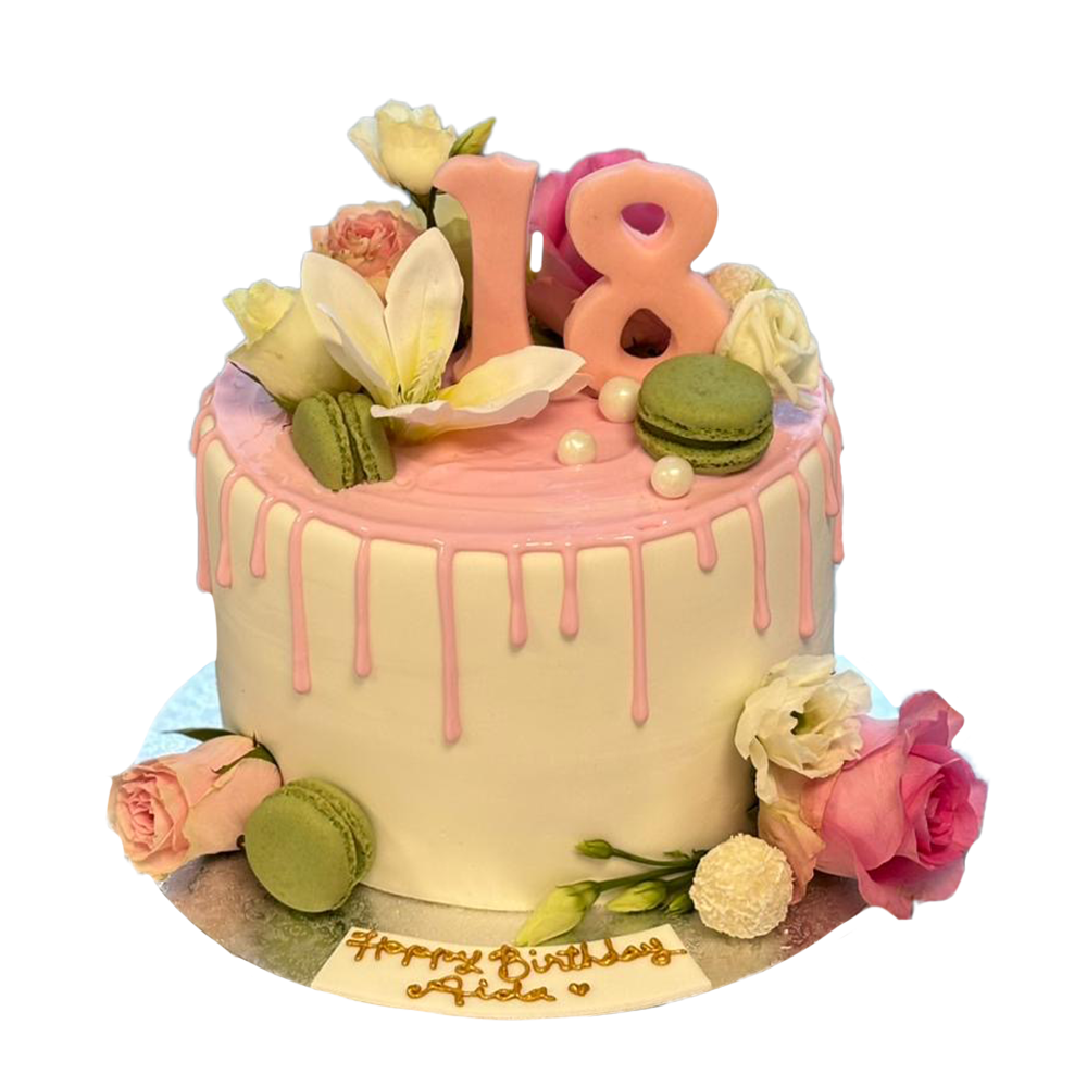 weißer Drip-Cake mit rosa Drip mit Macarons und  Blumen