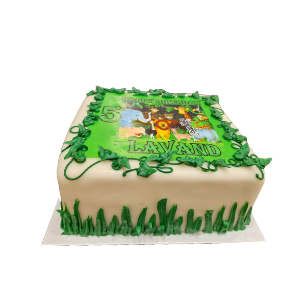 Weiße Torte mit Gras, Zoo-Foto und Ranken